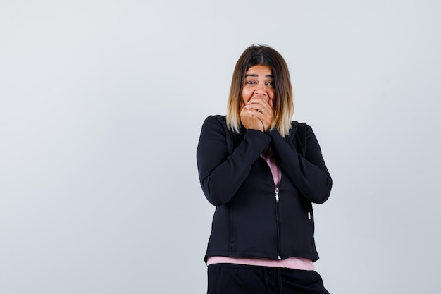 Expressive young lady posing in the studio