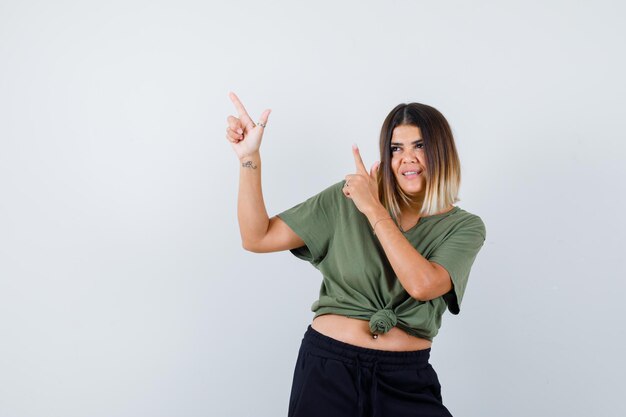 Expressive young lady posing in the studio