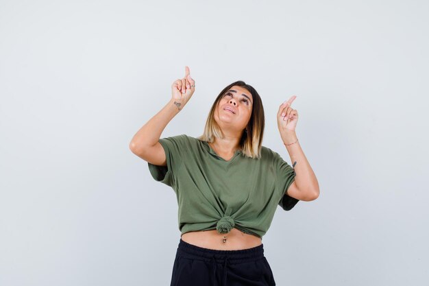 Expressive young lady posing in the studio