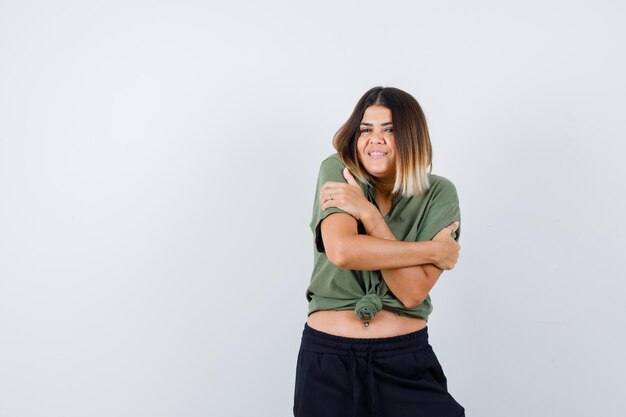 Expressive young lady posing in the studio