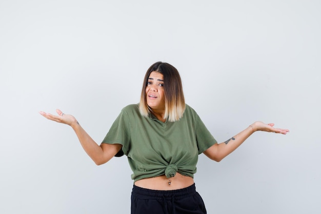 Expressive young lady posing in the studio