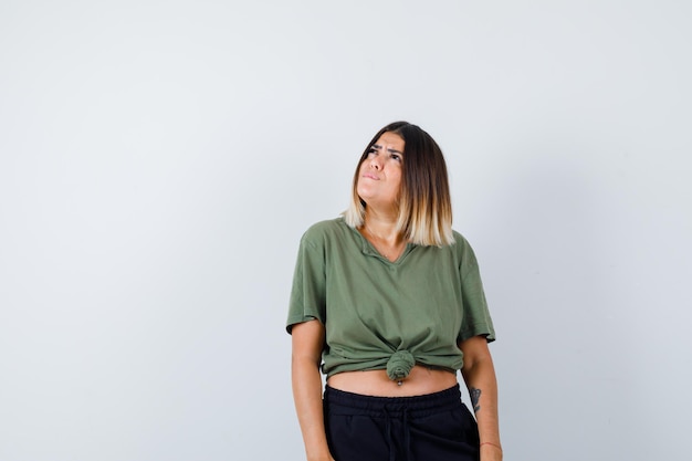 Expressive young lady posing in the studio