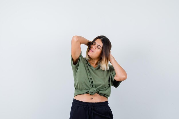 Expressive young lady posing in the studio