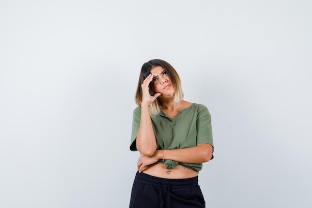 Expressive young lady posing in the studio