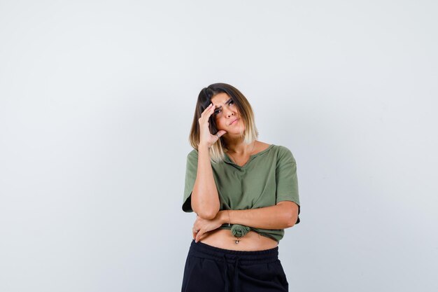 Expressive young lady posing in the studio