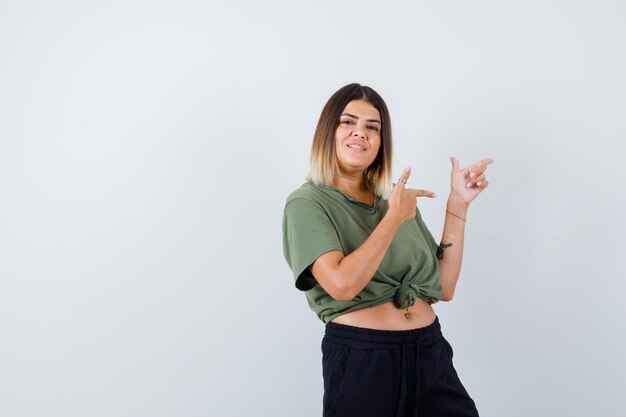 Expressive young lady posing in the studio