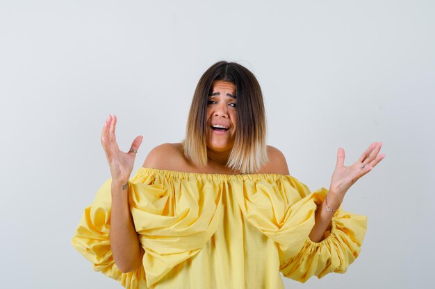 Expressive young lady posing in the studio