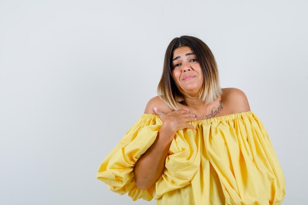 Expressive young lady posing in the studio