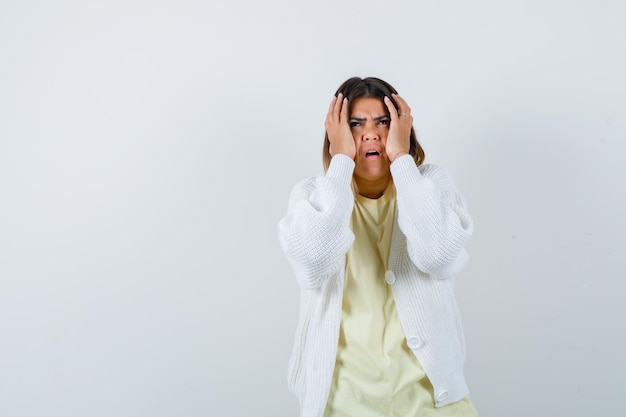 Expressive young lady posing in the studio