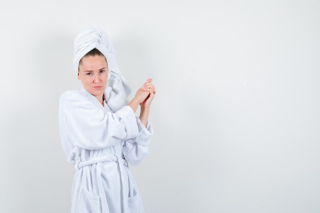 Expressive young lady posing in the studio