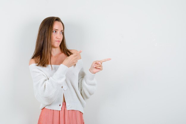 Expressive young lady posing in the studio