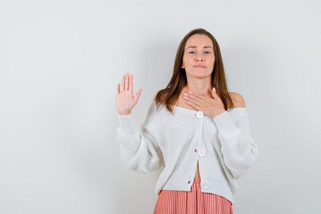 Expressive young lady posing in the studio