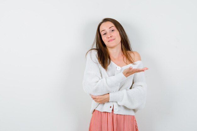 Expressive young lady posing in the studio