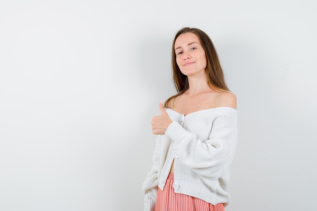 Expressive young lady posing in the studio