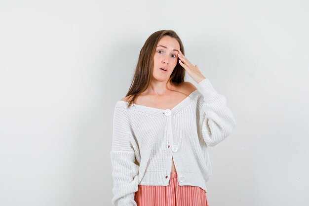 Expressive young lady posing in the studio