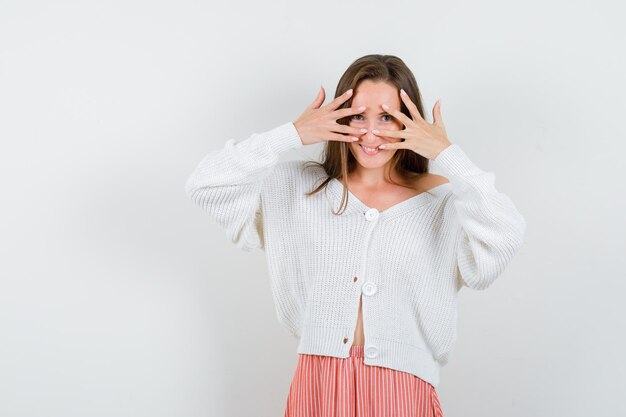 Expressive young lady posing in the studio