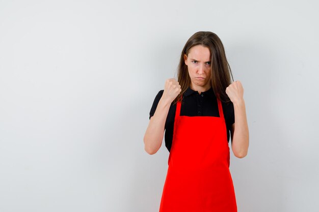 Expressive young lady posing in the studio