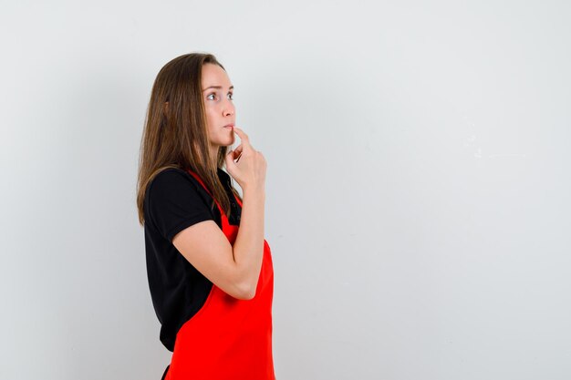 Expressive young lady posing in the studio