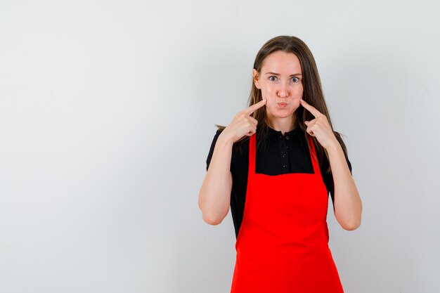 Expressive young lady posing in the studio