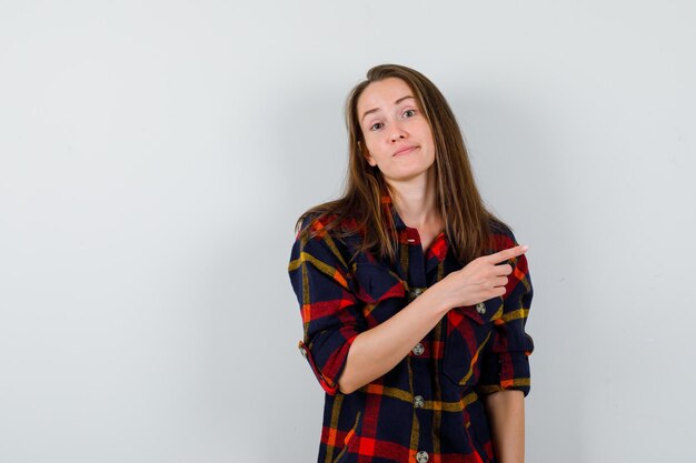 Expressive young lady posing in the studio