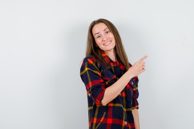 Expressive young lady posing in the studio