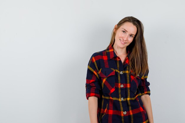 Expressive young lady posing in the studio