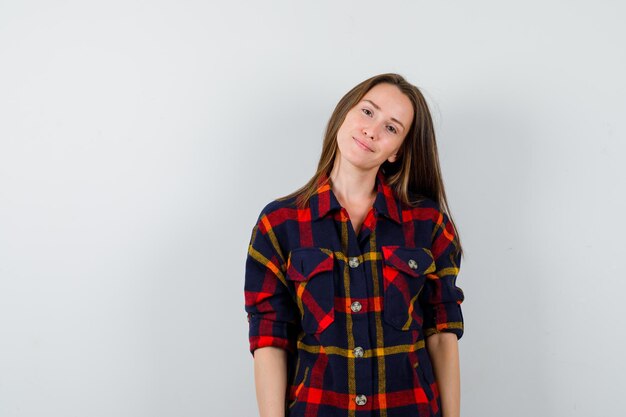 Expressive young lady posing in the studio