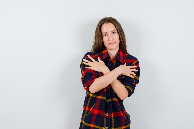 Expressive young lady posing in the studio