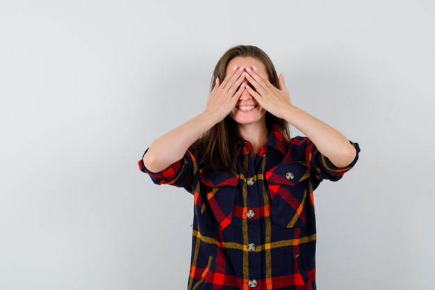 Expressive young lady posing in the studio