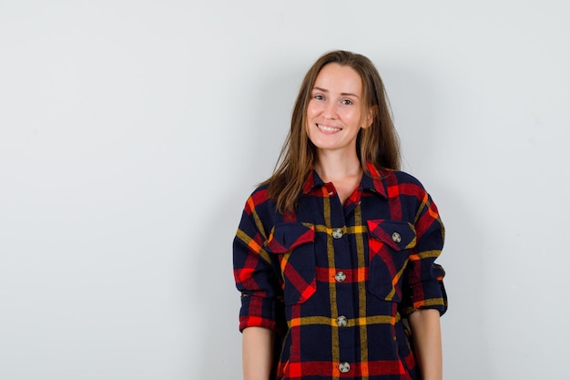 Expressive young lady posing in the studio