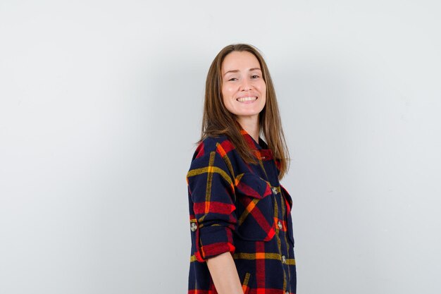 Expressive young lady posing in the studio