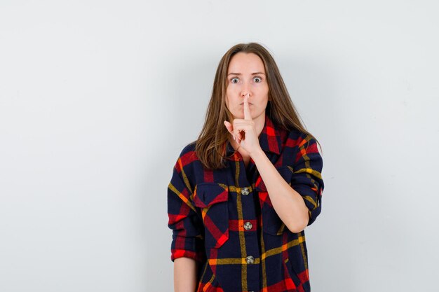 Expressive young lady posing in the studio