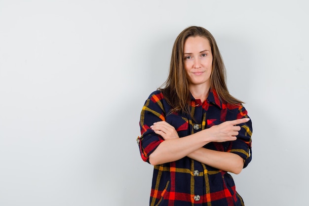 Expressive young lady posing in the studio