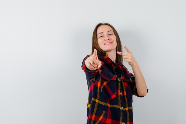 Expressive young lady posing in the studio