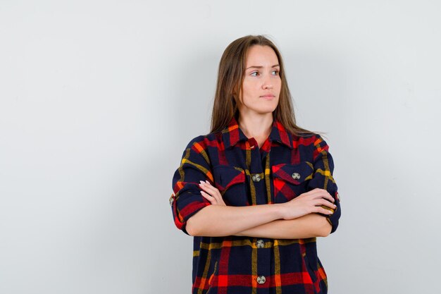 Expressive young lady posing in the studio