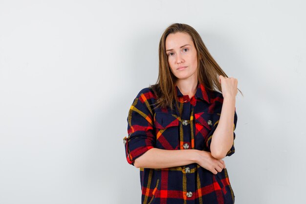 Expressive young lady posing in the studio