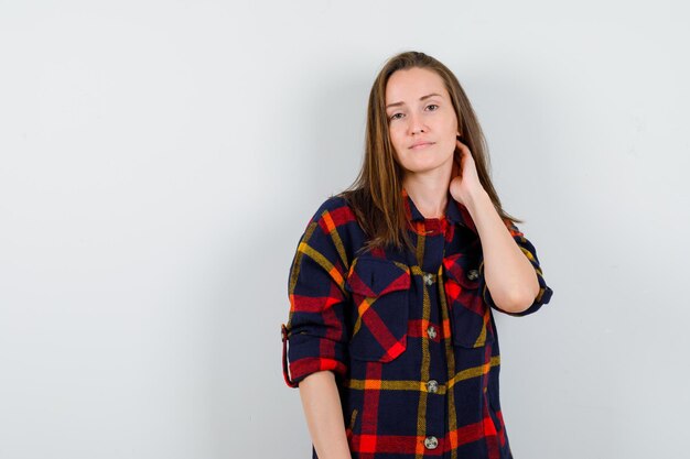 Expressive young lady posing in the studio