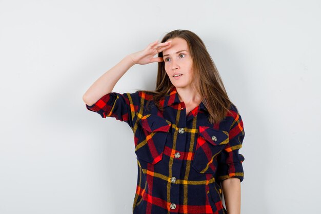 Expressive young lady posing in the studio