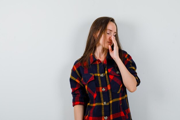 Expressive young lady posing in the studio