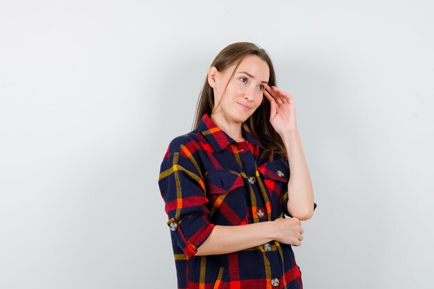 Expressive young lady posing in the studio