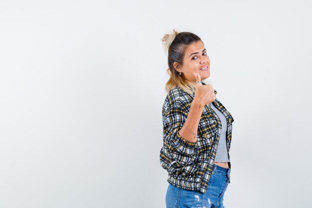 An expressive young lady posing