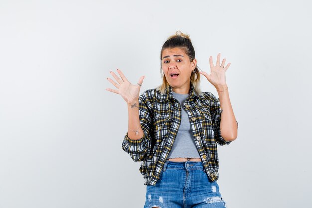 An expressive young lady posing