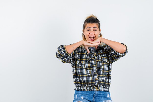 An expressive young lady posing