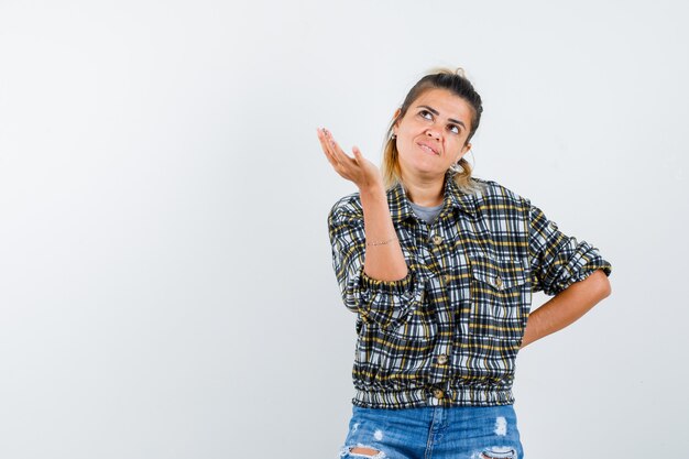 An expressive young lady posing