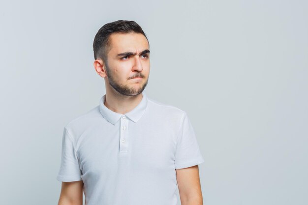 Expressive young male posing in the studio