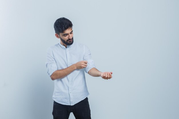 Expressive young male posing in the studio