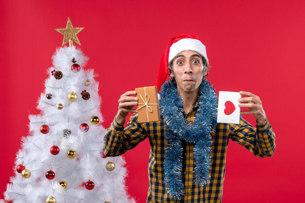 Expressive young man posing for Christmas