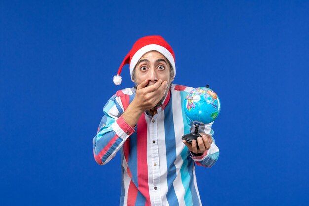 Expressive young man posing for Christmas