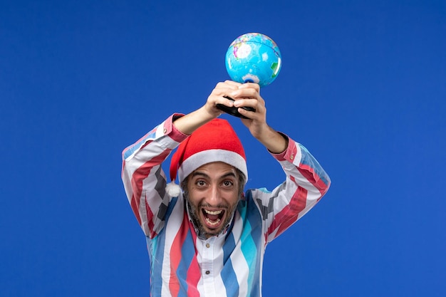 Free photo expressive young man posing for christmas