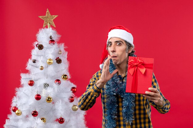 Expressive young man posing for Christmas